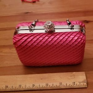 Pink box purse.